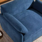 Fauteuil chenille surdimensionné avec assise profonde et coussins décoratifs