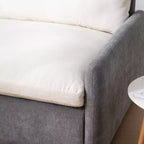 Fauteuil chenille surdimensionné avec assise profonde et coussins décoratifs