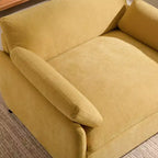 Fauteuil chenille surdimensionné avec assise profonde et coussins décoratifs
